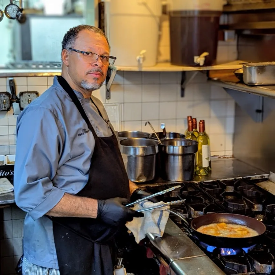 Chef preparing a dish in the Campanale's Restaurant kitchen