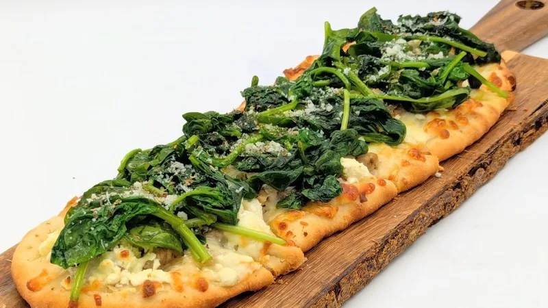 Broccoli rabe and cheese flatbread at Campanale's